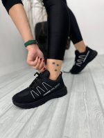 خرید اینترنتی کفش کتونی اسپرت زنانه دخترانه مدل سالامون شیک و زیبا رنگ مشکی سفید سبک اصفهان