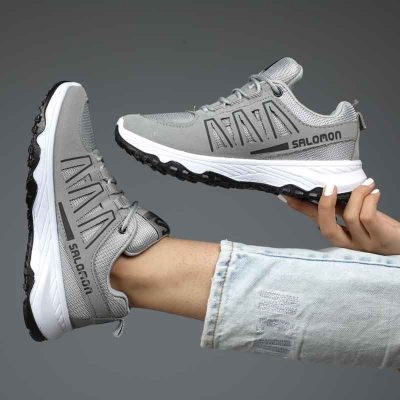 خرید اینترنتی کفش کتونی اسپرت مردانه پسرانه مدل سالامون جذااااب رنگ طوسی مشکی زیره سفید زیبا اصفهان