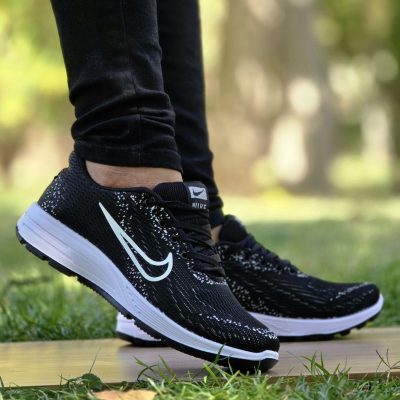 خرید اینترنتی کفش کتونی اسپرت مردانه پسرانه مدل نایک زیبا و اصیل رنگ مشکی زیره سفید سبک اصفهان