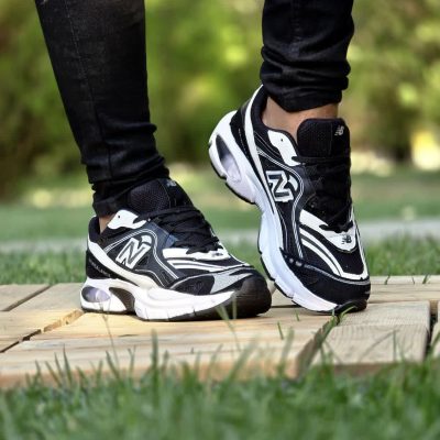 خرید اینترنتی کفش کتونی اسپرت مردانه و پسرانه مدل نیوبالانس طرح کپسولی رنگ مشکی سفید بی نظیر اصفهان