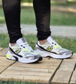 خرید اینترنتی کفش کتونی اسپرت مردانه و پسرانه مدل نیوبالانس طرح کپسولی خاص و جدید رنگ سفید طوسی بی مانند اصفهان