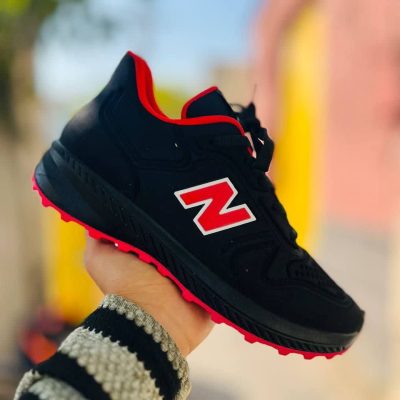 خرید اینترنتی کفش کتونی اسپرت مردانه و پسرانه مدل نیوبالانس زیبا و جذاب رنگ مشکی قرمز ساده اصفهان