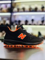 خرید اینترنتی کفش کتونی اسپرت مردانه و پسرانه مدل نیوبالانس بسیار مقاوم و بادوام رنگ مشکی نارنجی ویژه اصفهان