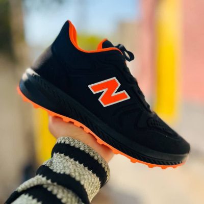 خرید اینترنتی کفش کتونی اسپرت مردانه و پسرانه مدل نیوبالانس بسیار مقاوم و بادوام رنگ مشکی نارنجی ویژه اصفهان
