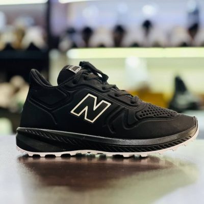 خرید اینترنتی کفش کتونی اسپرت مردانه و پسرانه مدل نیوبالانس فوق العاده عالی رنگ مشکی سفید مقاوم اصفهان